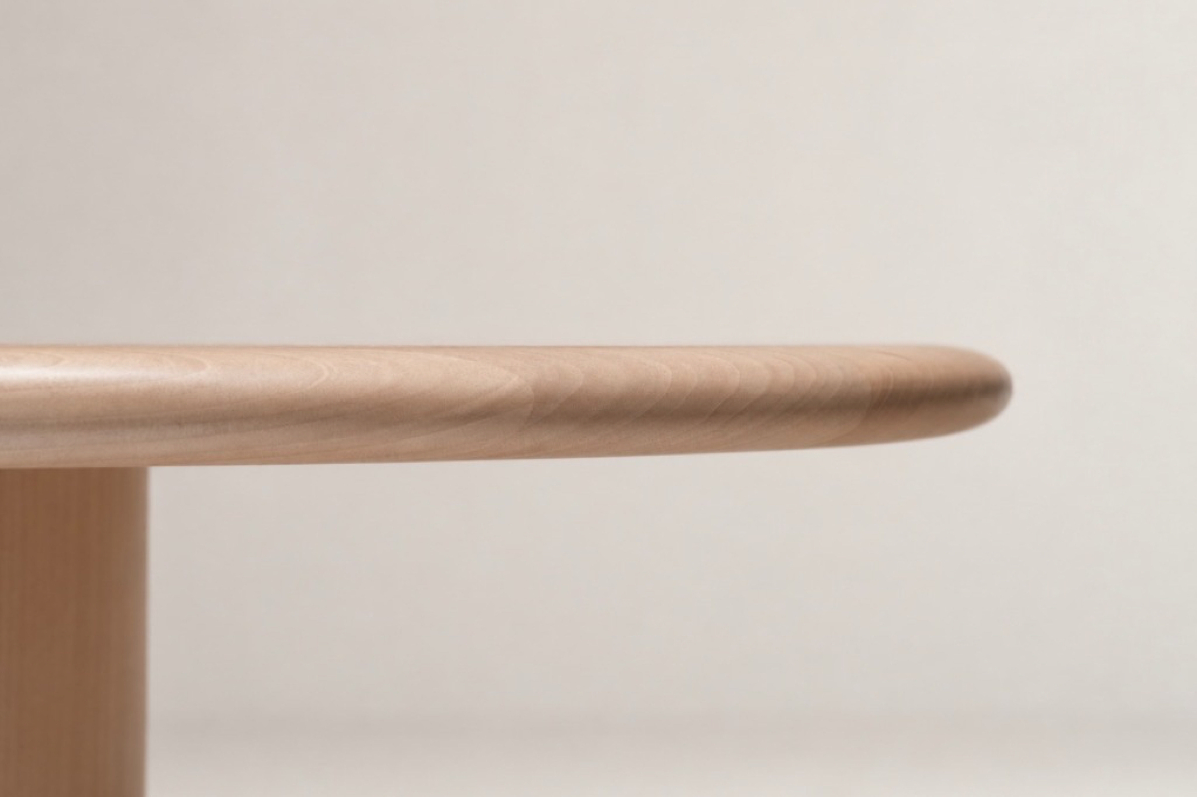 Paul Table precision machined asymmetric soft bullnose perimeter profile