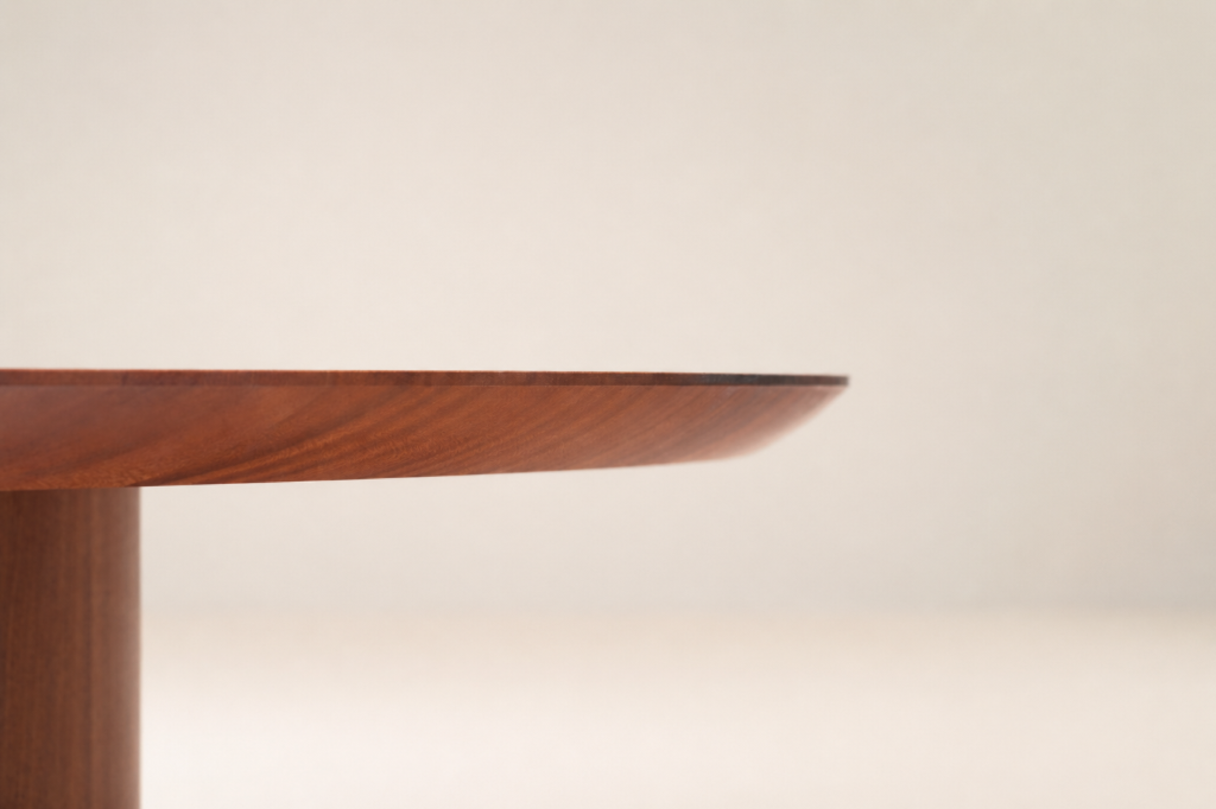 The Round Table sculpted underside edge bevel and pedestal intersection